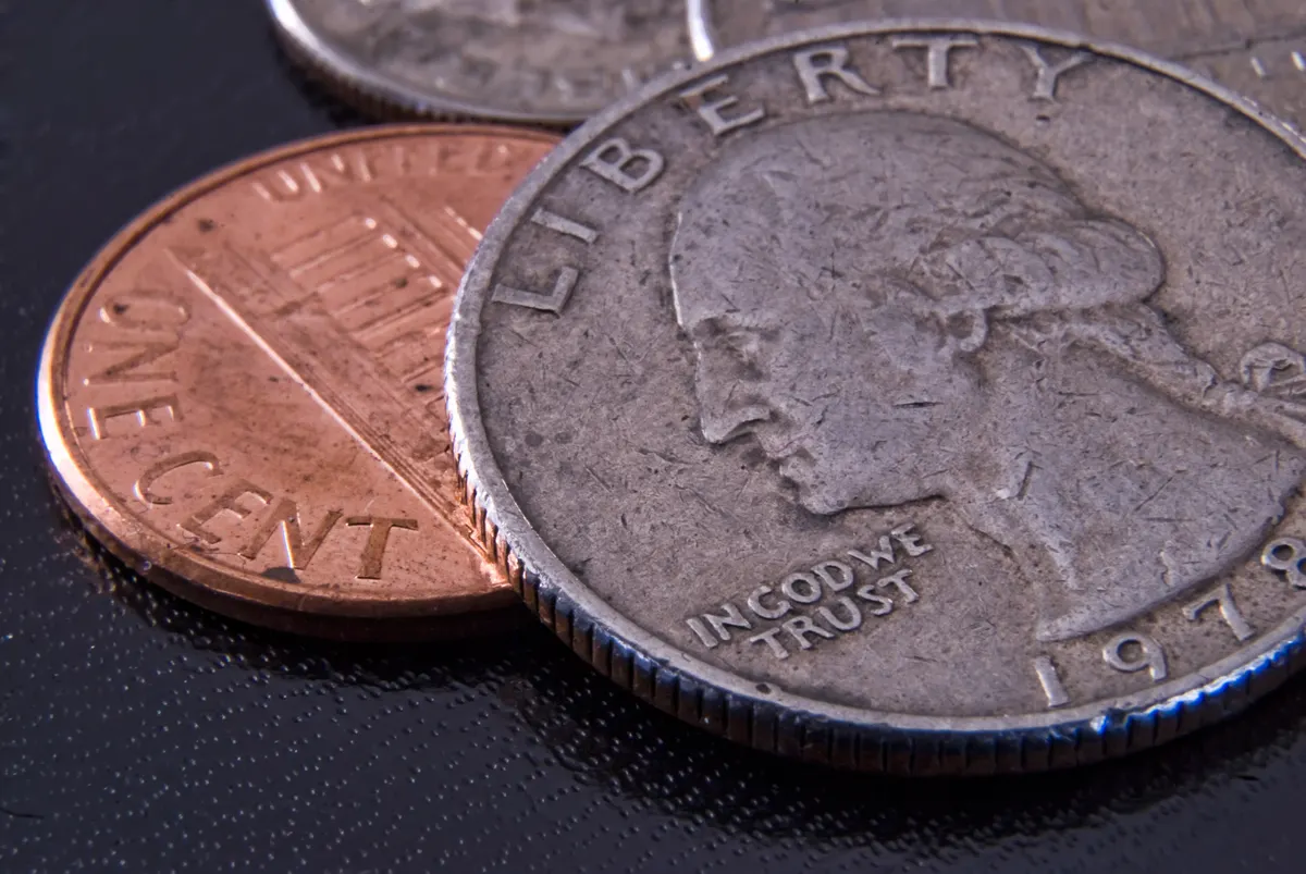 Detailed close-up of a Morgan Silver Dollar showcasing Lady Liberty's profile and the year of issue.