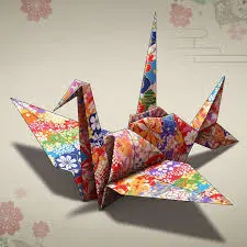 Advanced sculptural origami piece combining curved folds and geometric patterns