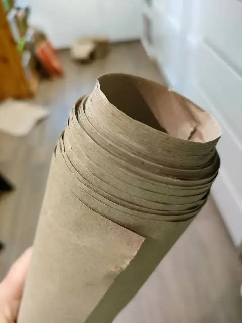 A point of paper being tucked inward between layers to form an inside reverse fold.