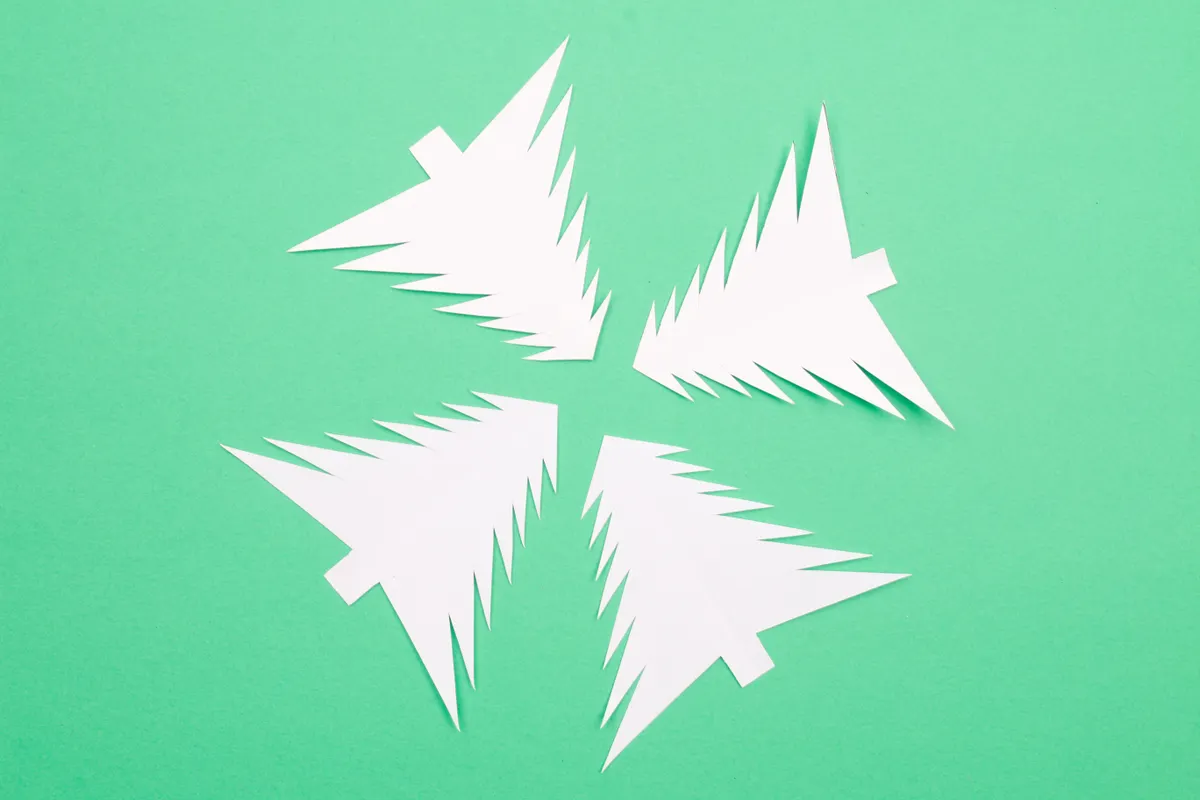 A detailed side-by-side comparison illustrating the visual differences between traditional origami and kirigami techniques.