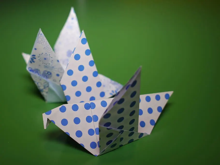 An intricate origami crease pattern displayed on a screen, showing various fold lines and geometric structures.