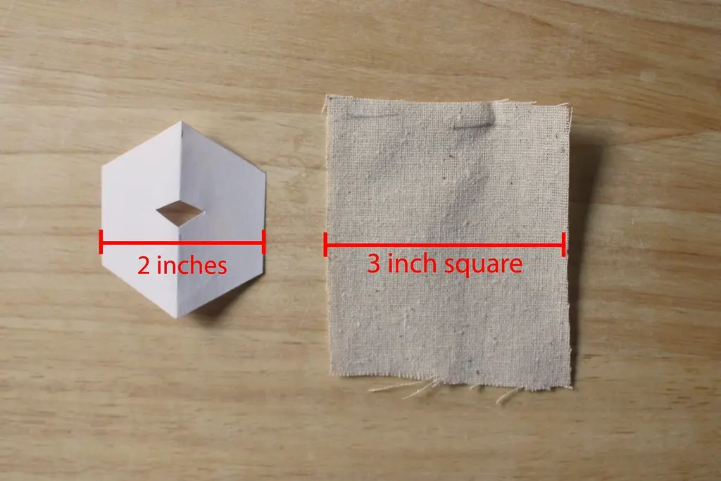 Different sizes of square origami paper ranging from three inches to ten inches for comparison.